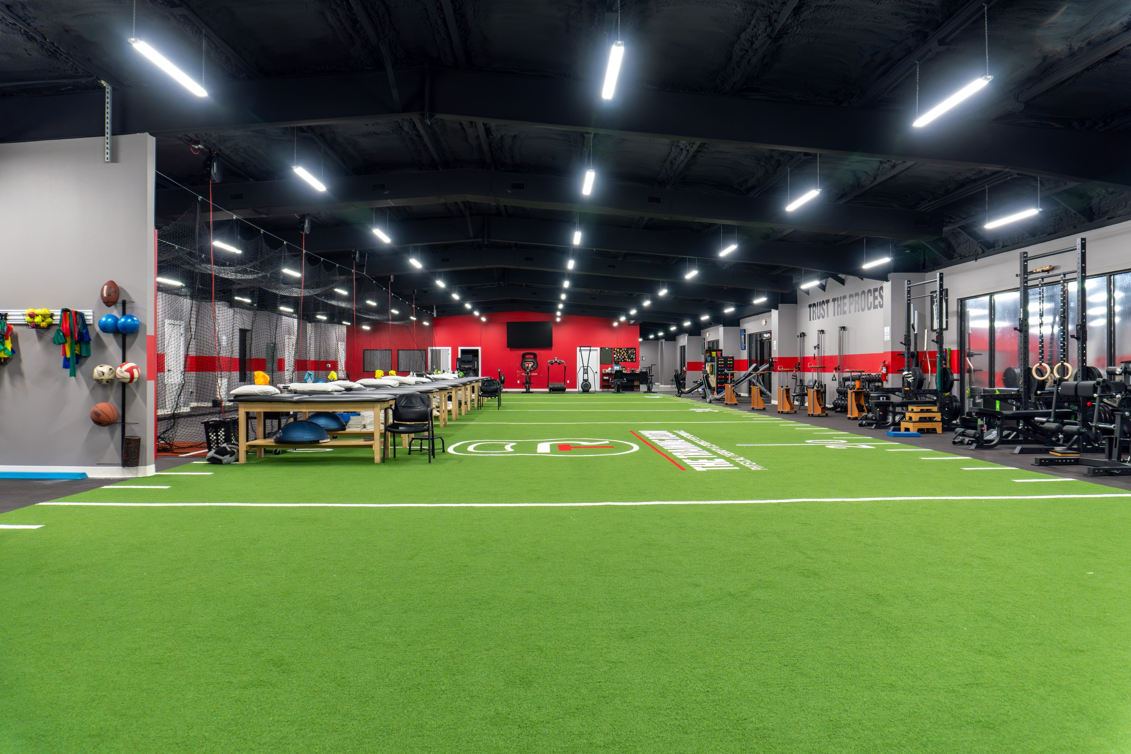 The Training Room Corpus Christi full facility with Trust The Process wall