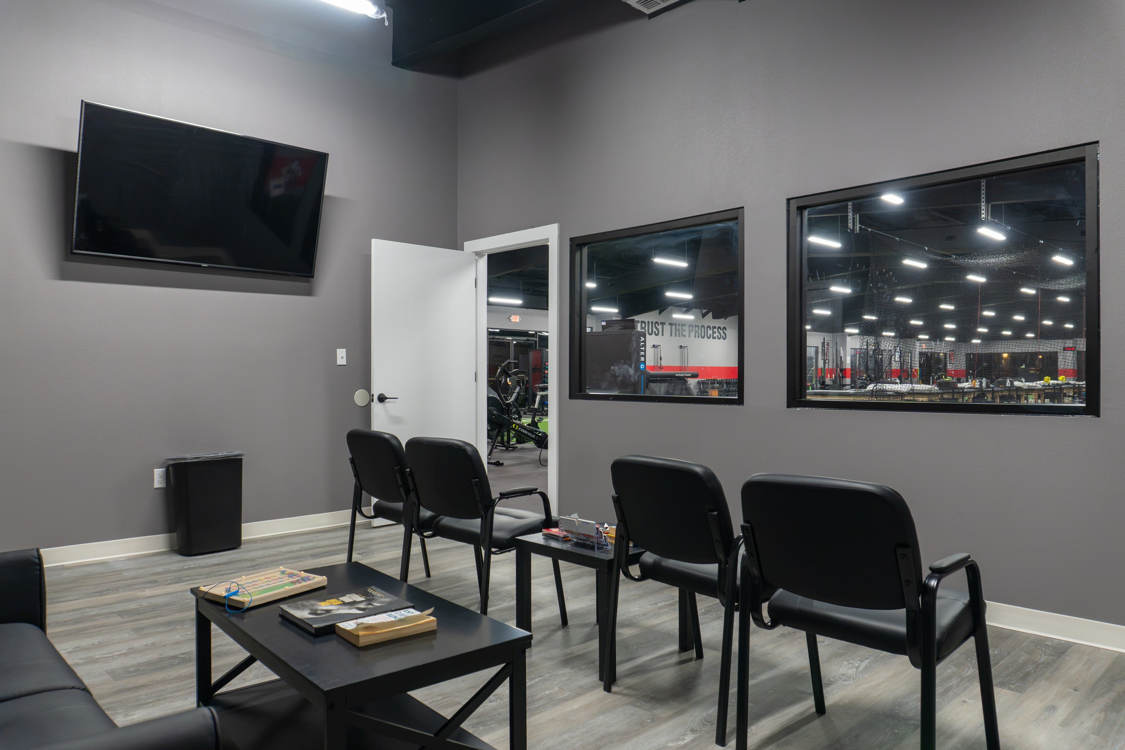 The Training Room Corpus Christi waiting room with windows to facility