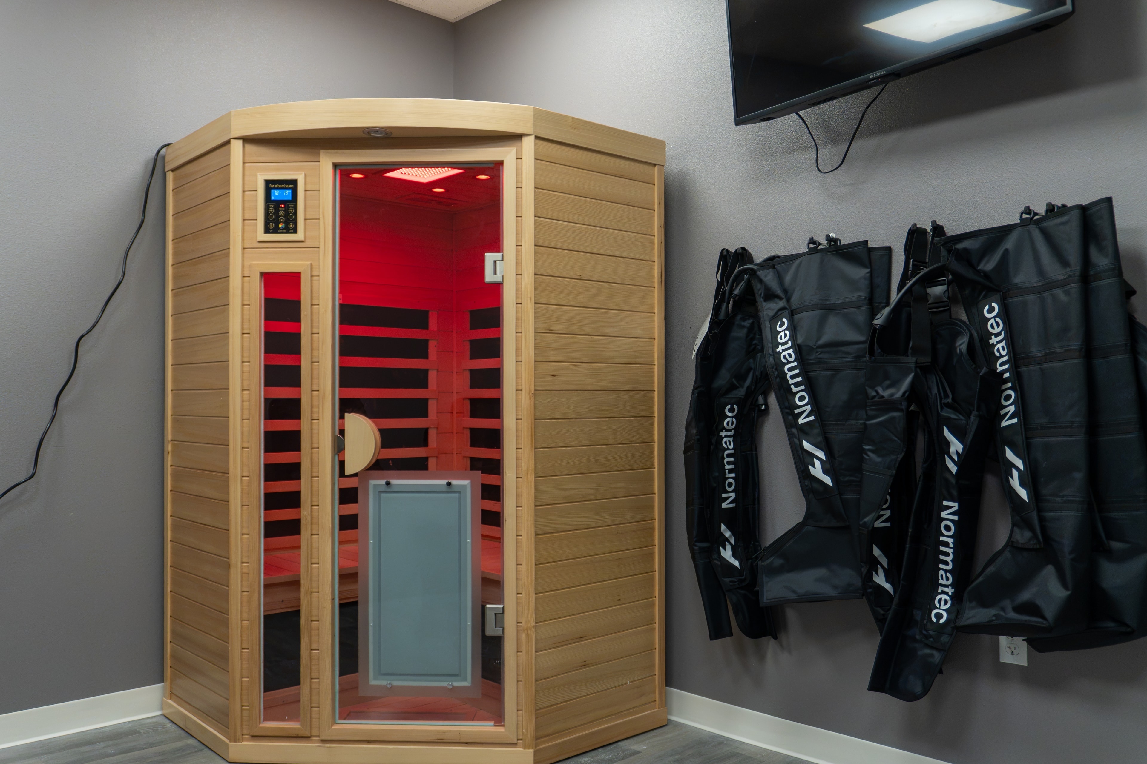 The Training Room Corpus Christi infrared sauna and Normatec boots