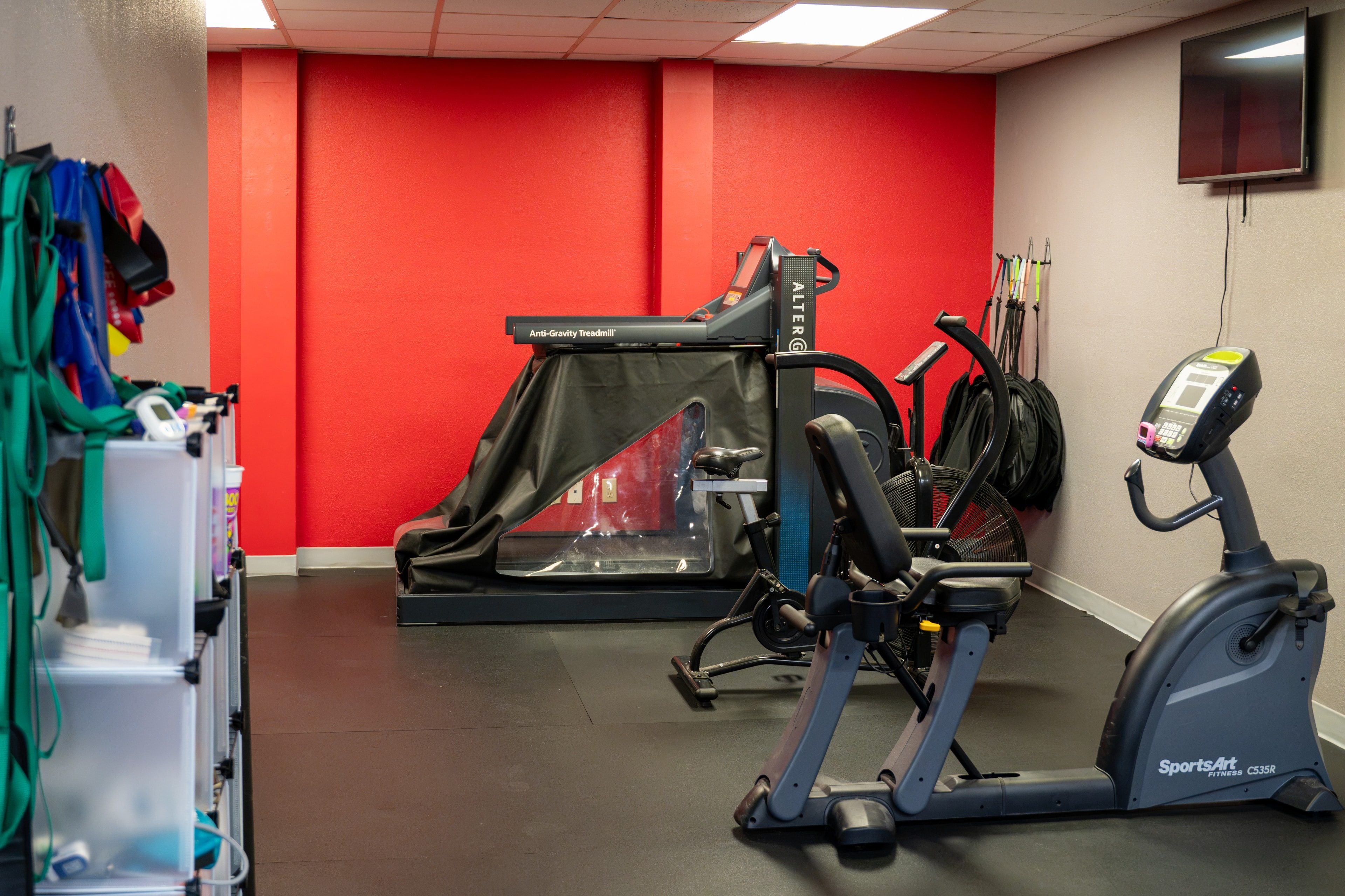 The Training Room Portland cardio room with AlterG, air bike and SportsArt cycle