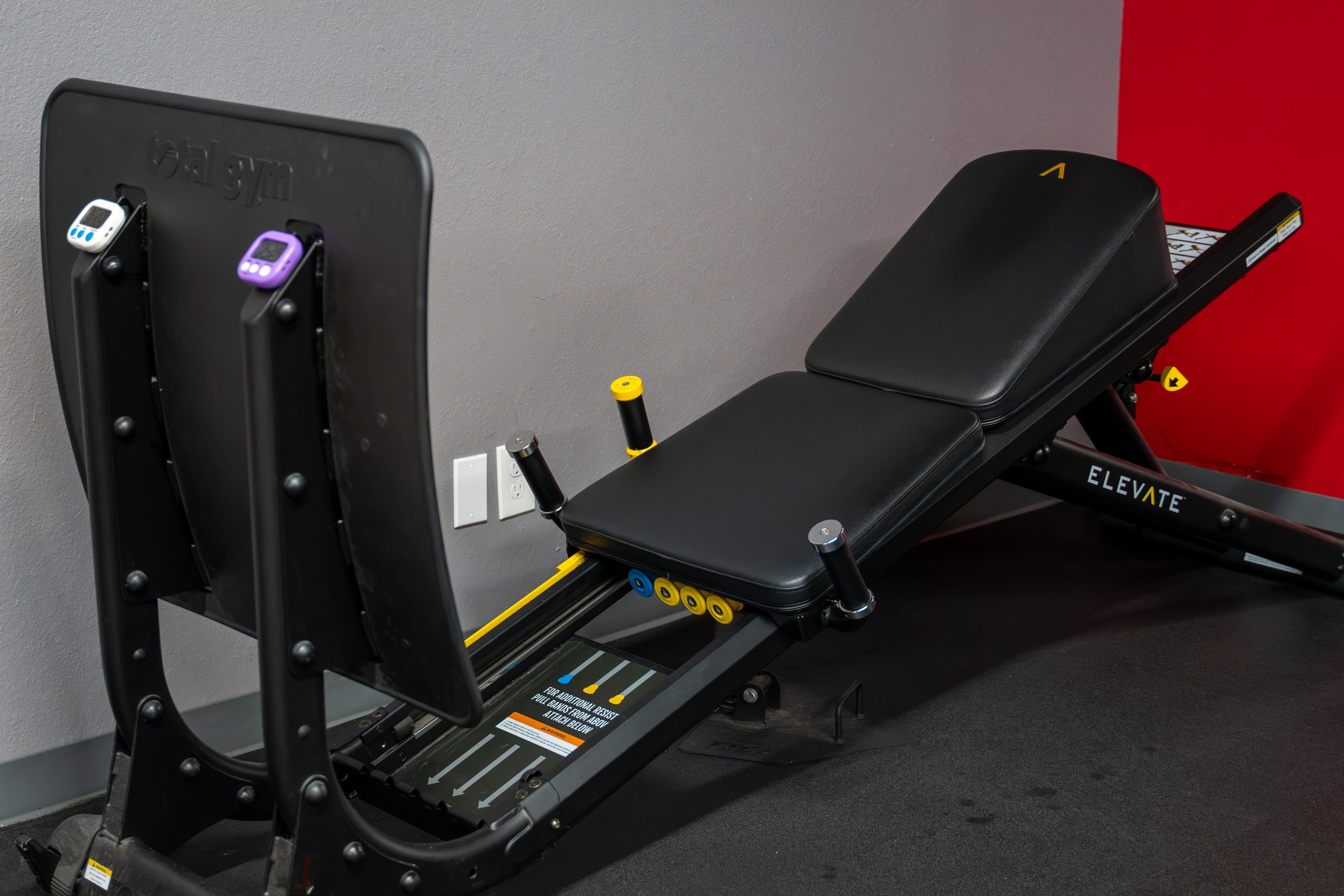 The Training Room Portland Total Gym and Elevate bench close-up
